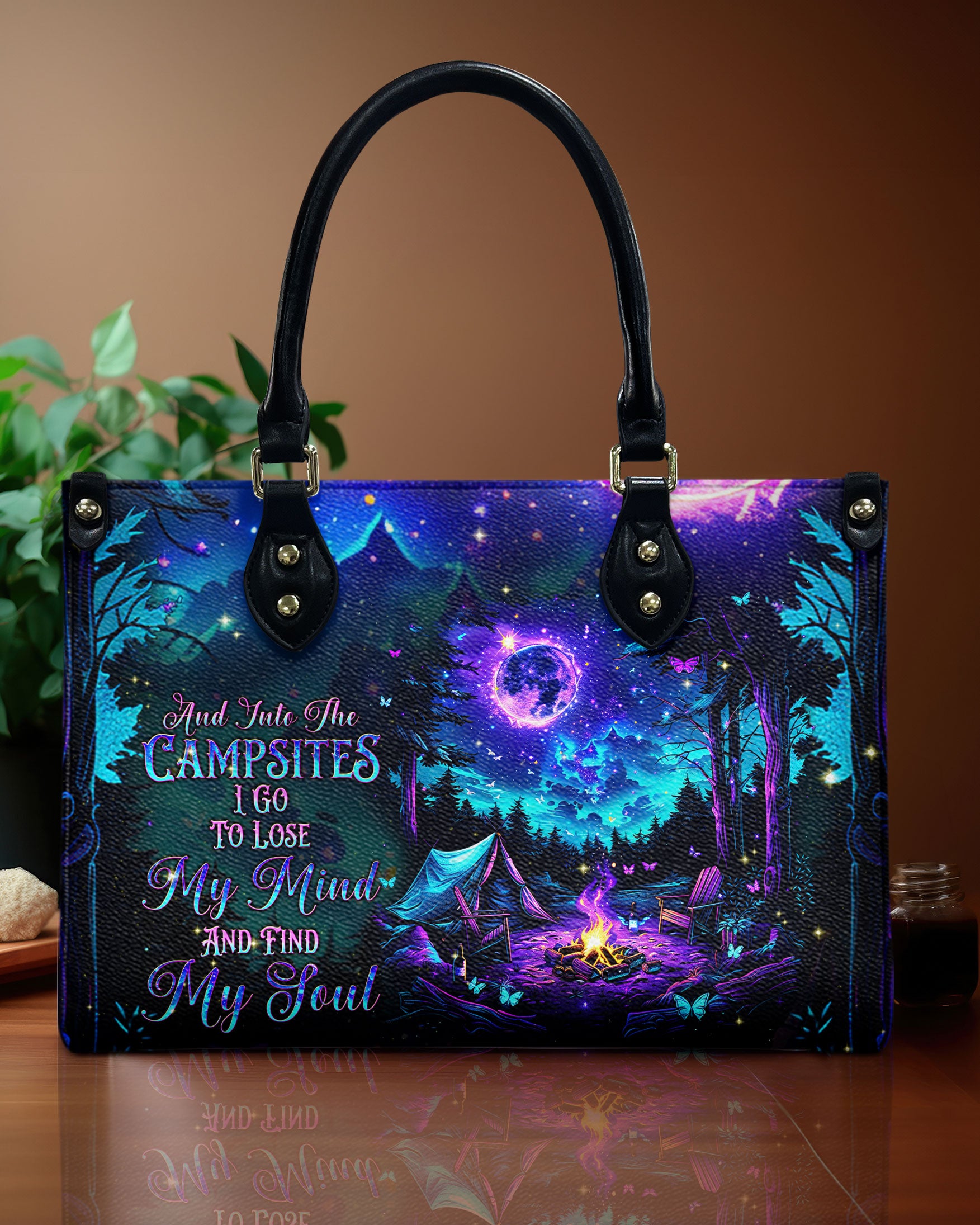 AND INTO THE CAMPSITES I GO  LEATHER HANDBAG - TLNT0611244